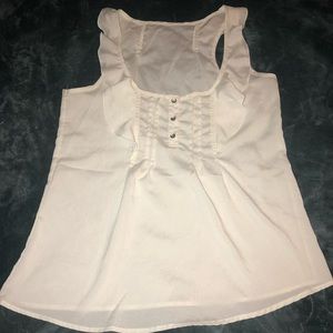 White sleeveless blouse